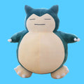 Pelúcia do Pokémon Snorlax Cor azul-esverdeado com a Barriga e Rosto Bege